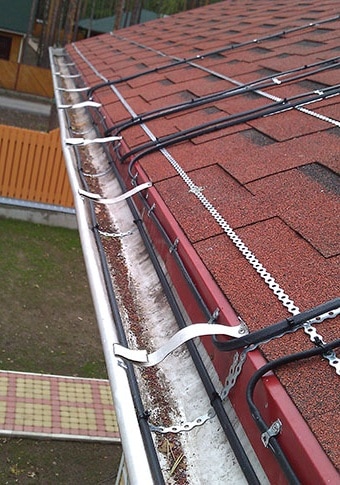 Фото - организация обогрева кровли частного дома